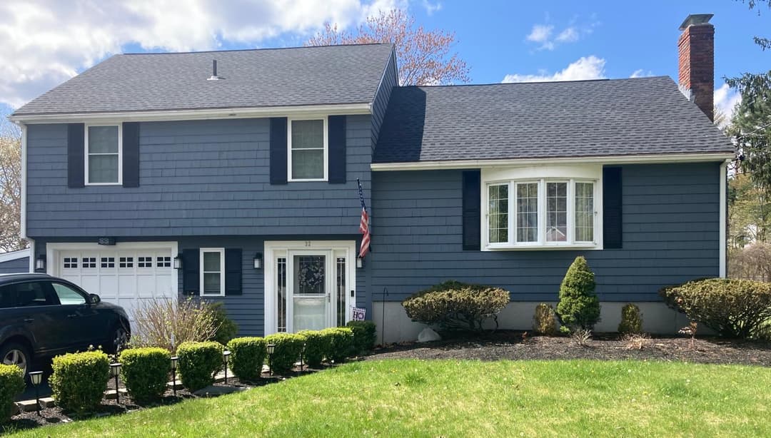 picture of a newly painted blue house